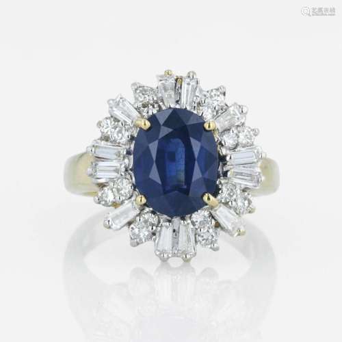 An 18K yellow gold, sapphire, and diamond ring