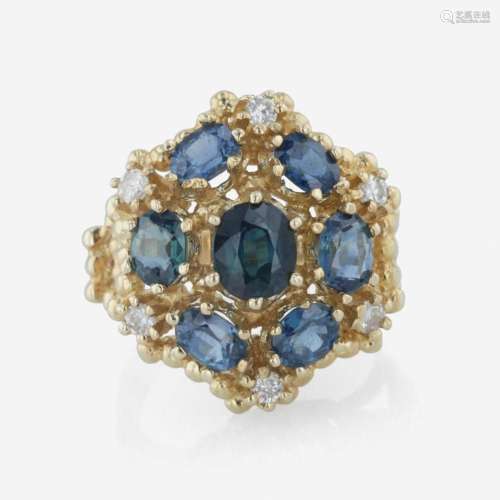 A 14K yellow gold, sapphire, and diamond ring
