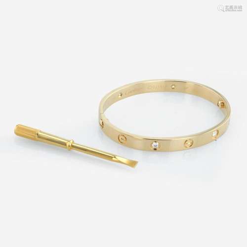 An 18K yellow gold and diamond bracelet, Cartier Love Bracel...