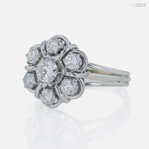 A 14K white gold and diamond ring