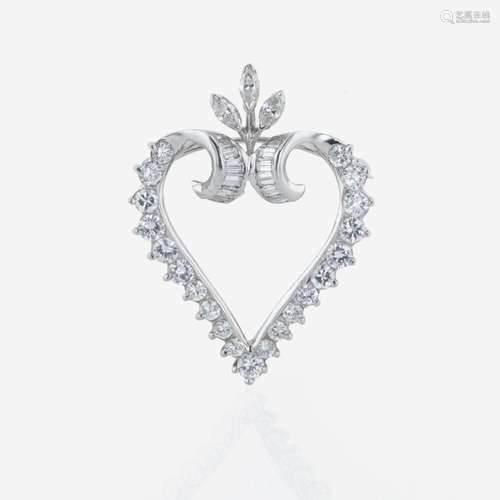 A platinum and diamond pendant/brooch