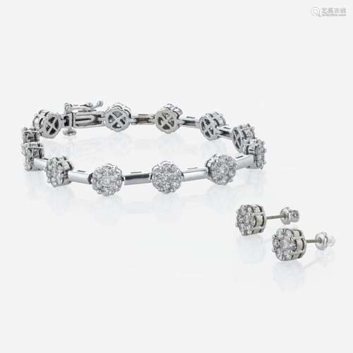 A diamond bracelet and matching diamond stud earrings