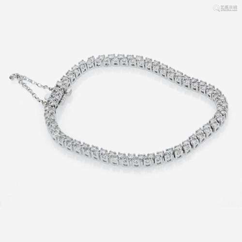 A 14K white gold and diamond bracelet