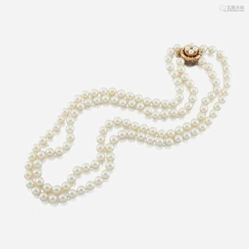 A cultured pearl, diamond, and gold necklace