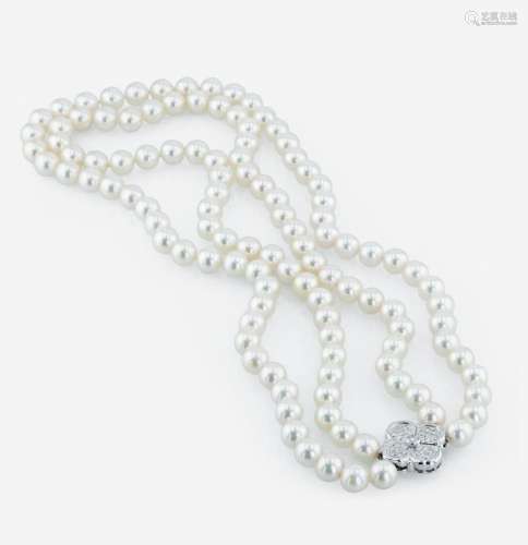 An 18K white gold, cultured pearl and diamond necklace, Miki...