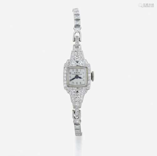 A platinum and diamond watch, Girard Perregaux
