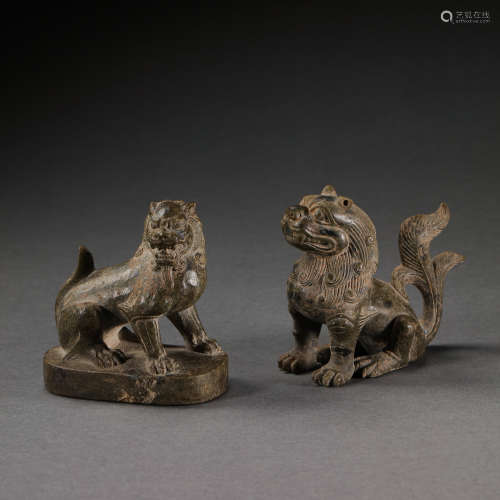 A PAIR OF CHINESE TANG DYNASTY STONE BEASTS