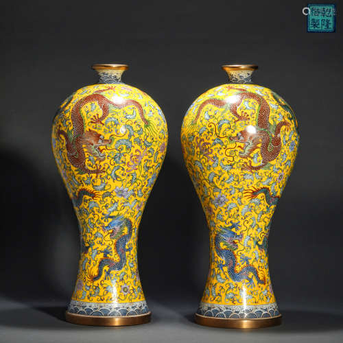 A pair of Qing Dynasty bronze enamel colored dragon ornament...