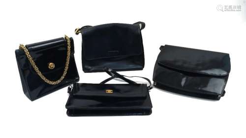 A group of four black handbags, to include a Rayne leather a...