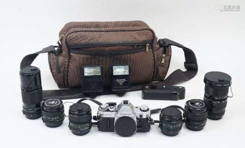 A Canon AE-1 SLR camera, chrome, serial no. 3517711, with Ca...
