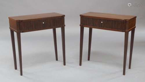 A pair of Italian mahogany side tables, circa 1950, each wit...