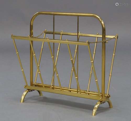 A French brass folding magazine rack, circa 1960, with foldi...