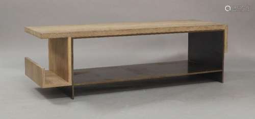 A contemporary elm and steel coffee table, of recent manufac...
