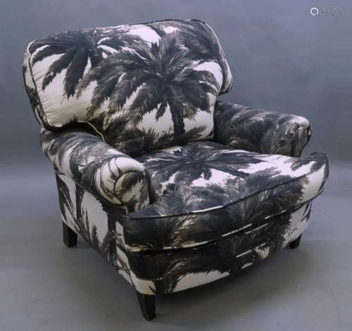 A George Smith armchair with matching ottoman, both upholste...