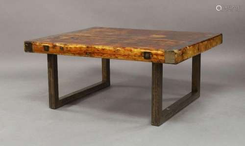 A contemporary Pine coffee table with resin casing, raised o...