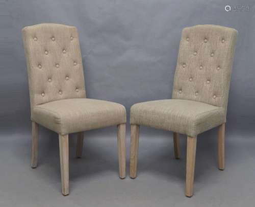A set of six modern dining chairs by Neptune, with button ba...