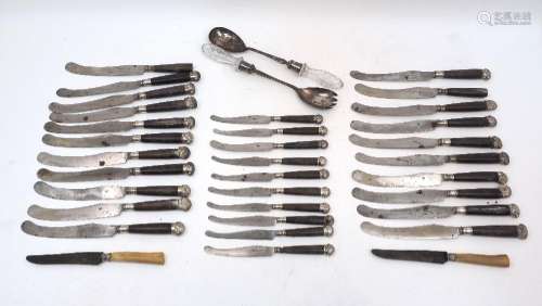 A set of 18th century knives with silver mounted wooden hand...