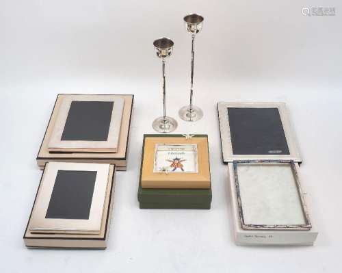 A group of five silver plated photo frames, including: two c...
