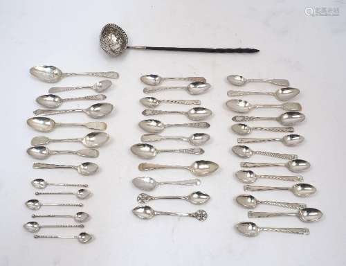 A group of silver tea and coffee spoons, including: a pair o...