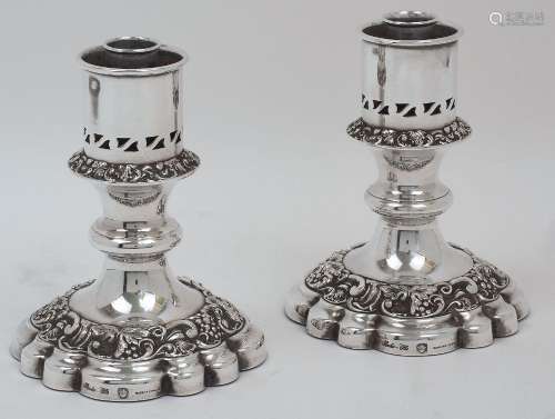 A pair of silver plated candlesticks, Barker Ellis, each wit...