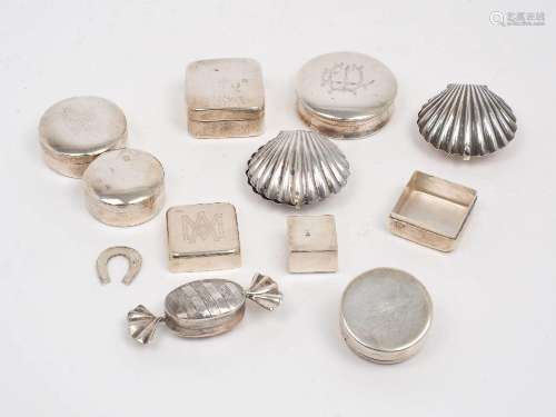 Ten silver and white metal trinket and pill boxes, all stamp...