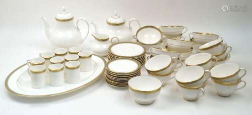 A Royal Doulton Clarendon pattern dinner service, comprising...