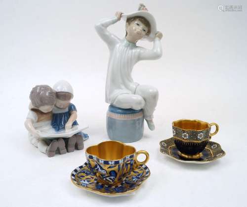 Two Coalport miniature cups and saucers, one with white and ...