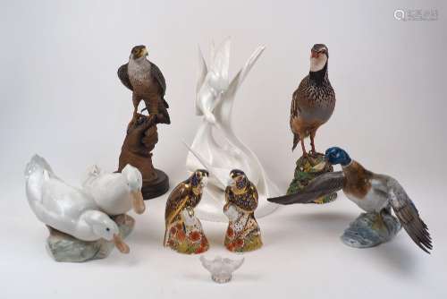 A group of bird sculptures, 20th century, to include a pair ...