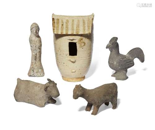 Four Chinese pottery figures and a model of a bird house, Ha...