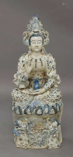 A large Chinese porcelain blue and white figure of Guanyin, ...