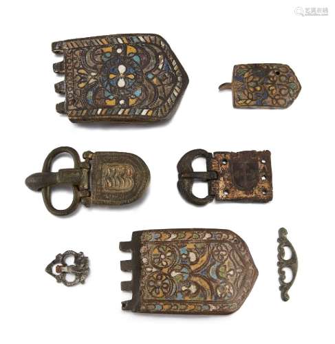 A group of Byzantine bronze buckles and fittings, some with ...