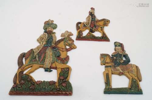 Three Austro-Hungarian polychrome wax relief figures on hors...