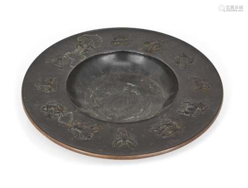 Fritz Nuss, German, 1907-1999, a cast bronze `Zodiac` bowl, ...