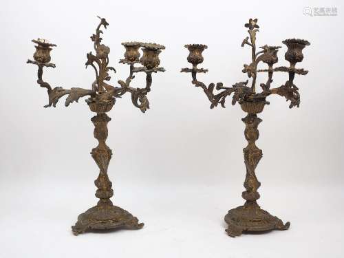 A pair of Victorian gilt-bronze three-light candelabra, by T...