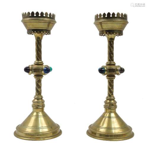 A pair of Gothic Revival brass candlesticks, late 19th/early...