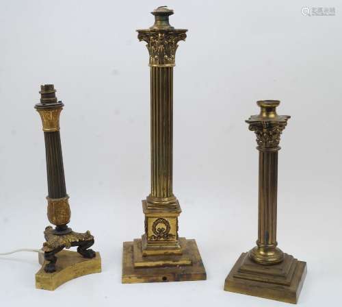 Three gilt and patinated bronze column table lamps, 19th cen...