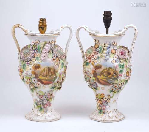 A pair of Continental floral encrusted twin handled vases, 2...