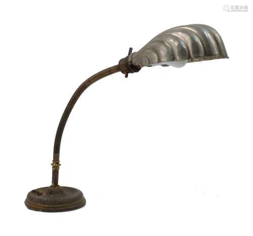 An adjustable brass table lamp, early to mid 20th century, w...