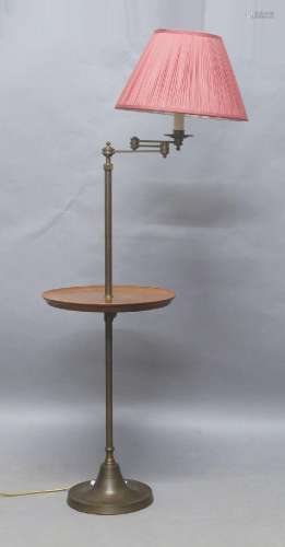 A brass and mahogany floor lamp, 20th century, the adjustabl...