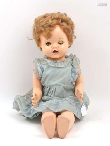 A mixed lot of vintage hard plastic and composition dolls in...