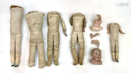 A doll restorer’s lot of cloth and kid leather dolls bodies,...