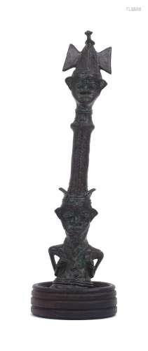 An African bronzed metal figurative sceptre, 20th century, s...