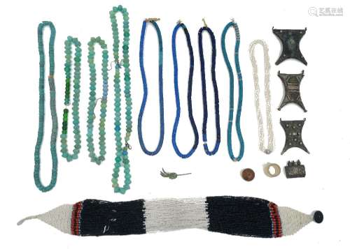 A quantity of tribal necklaces and beads and other jewellery...