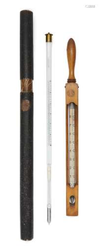 Two Continental thermometers comprising: a Danish fruitwood ...