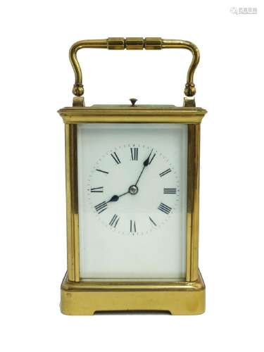 A gilt-brass repeating carriage clock, 20th century, the cor...