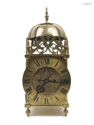 A brass cased lantern style mantel clock, early 20th century...