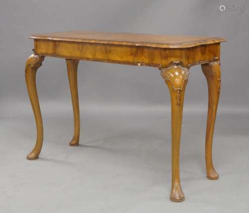 A pair of Queen Anne style walnut console tables, 20th centu...
