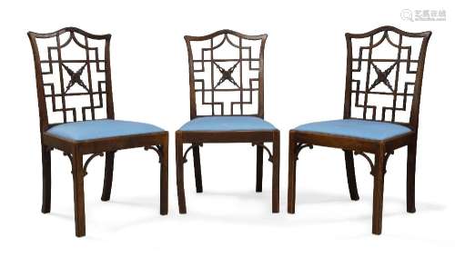 A set of three George III mahogany side chairs, circa 1765, ...