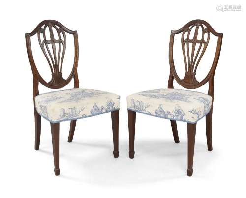 A pair of George III mahogany side chairs, circa 1780, the s...