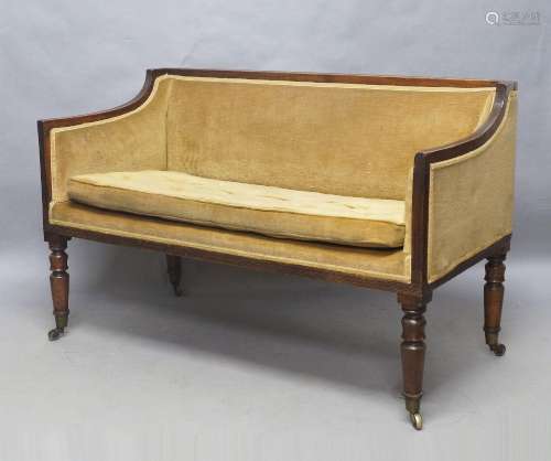 A George III mahogany window sofa, the reeded frame with vel...